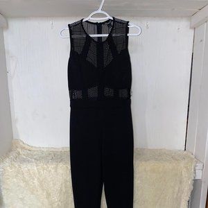 Revamped; black jumpsuit, mesh top